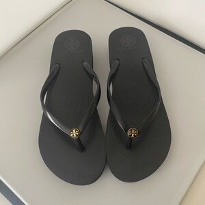 Tory Burch Black Flip Flops with Gold Logo Accents, Women’s size 9-10.